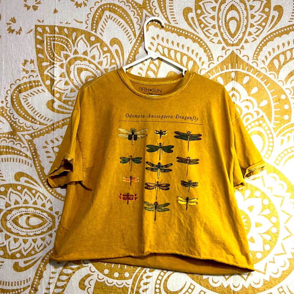 Yellow crop top with different types of painted dragonflies and a quote on back